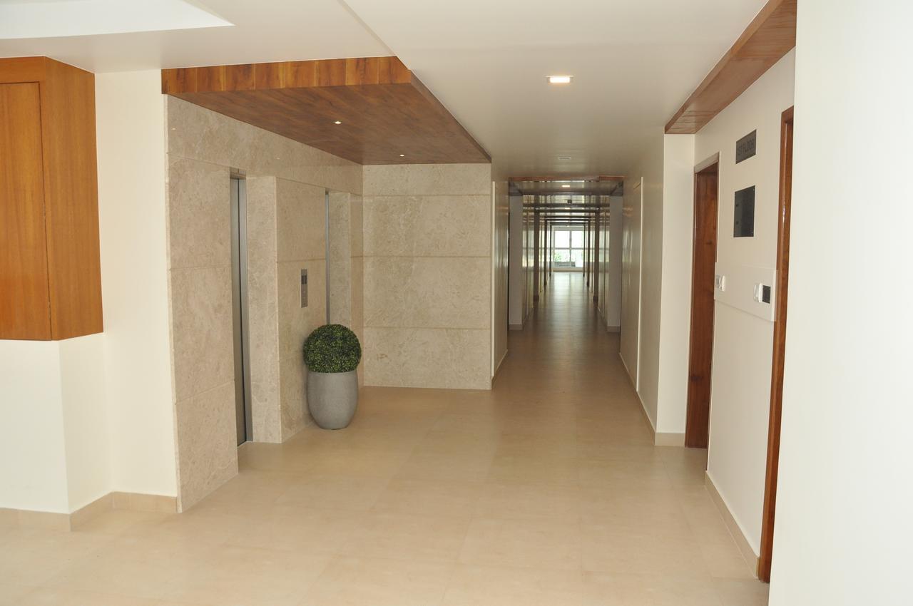 Palguni Residency Hassan Exterior foto